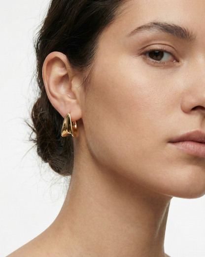 14k Gold Sculpted Triangle Hoop Earrings.